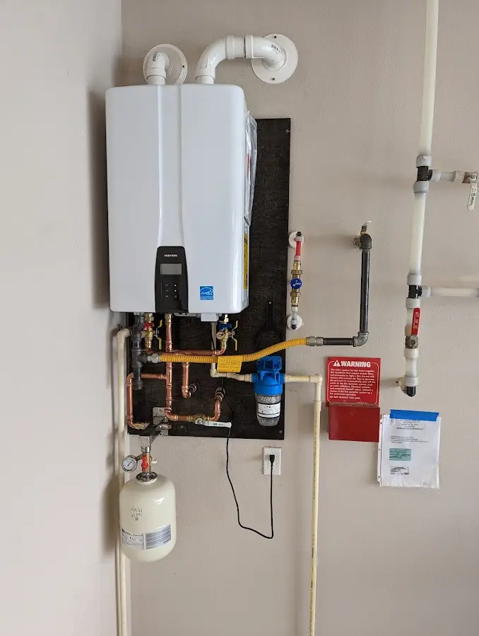 Professional plumber installing copper piping in a South Lake Tahoe home